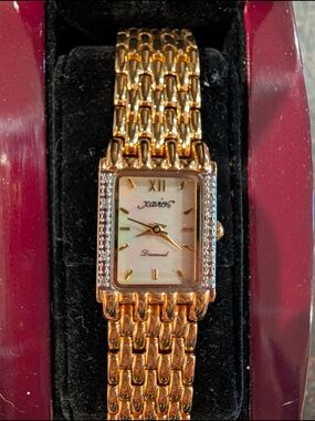 XAVIER pearl face natural diamond accent 18k gold plated woman's watch with box